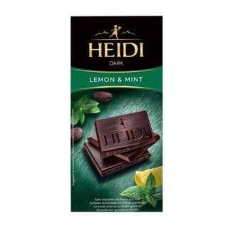 Packaging of Heidi Dark Mint & Lemon chocolate bar with an image of the chocolate bar, mint leaves, and lemon slices.