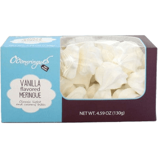 Pure white vanilla flavored meringue drops in a glass jar.