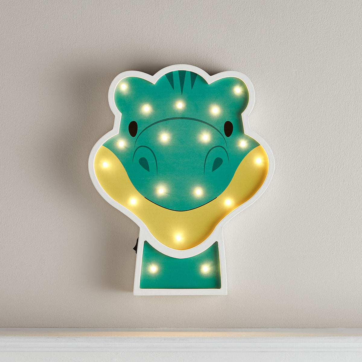 Leuchtende Dino-Wandlampe mit warmweißen LEDs in Form eines freundlichen Diplodocus