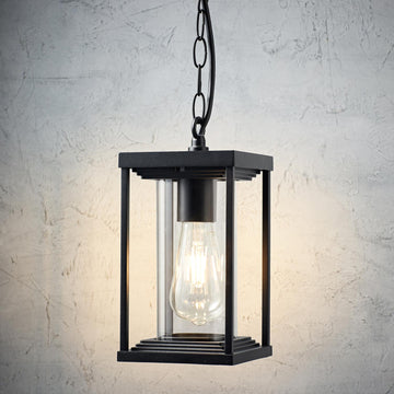 Schwarze laternenförmige Outdoor Hängelampe aus Glas und Aluminium mit sichtbarer E27 Glühbirne